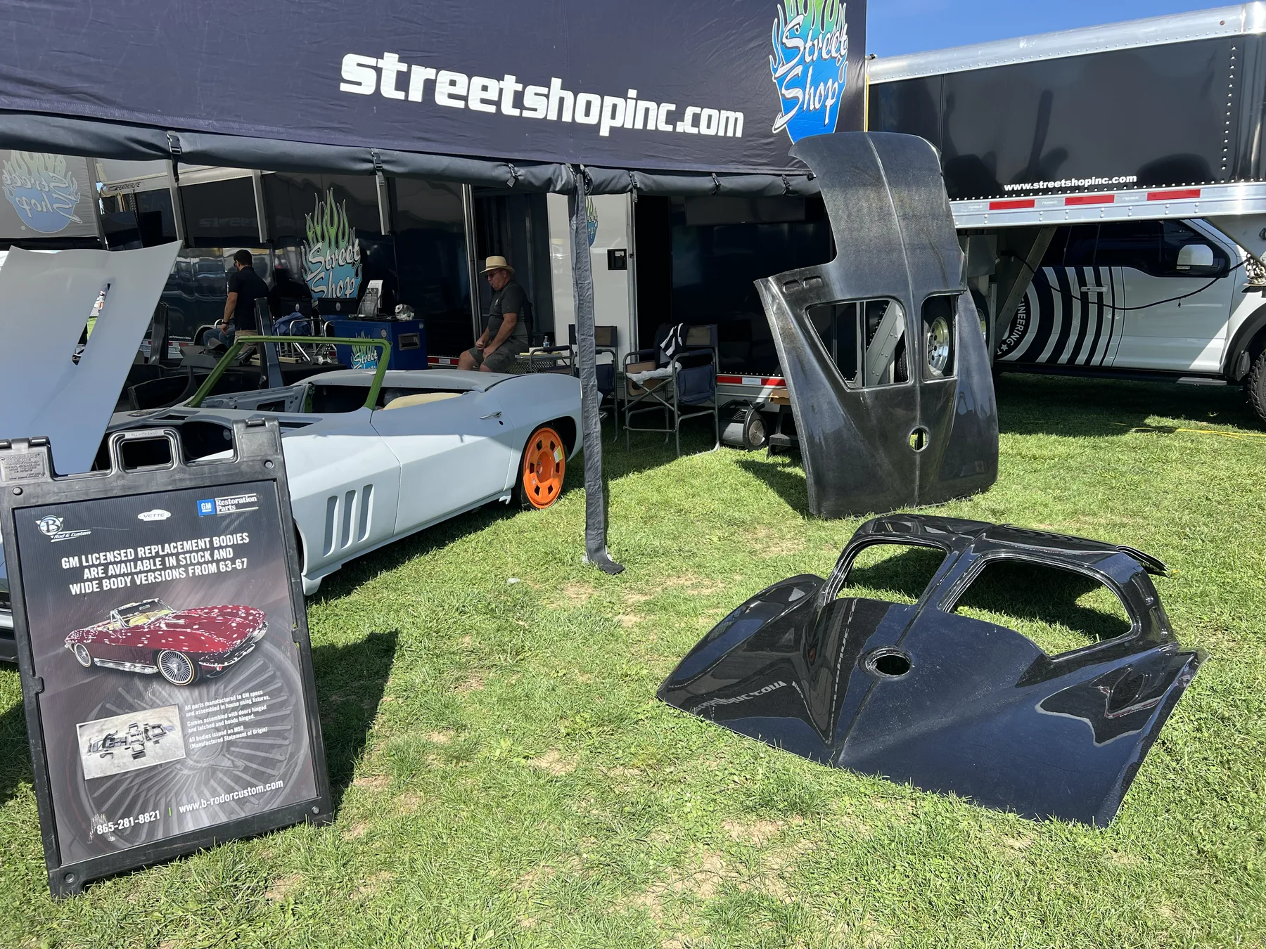 Arranged Corvette body panels and components.