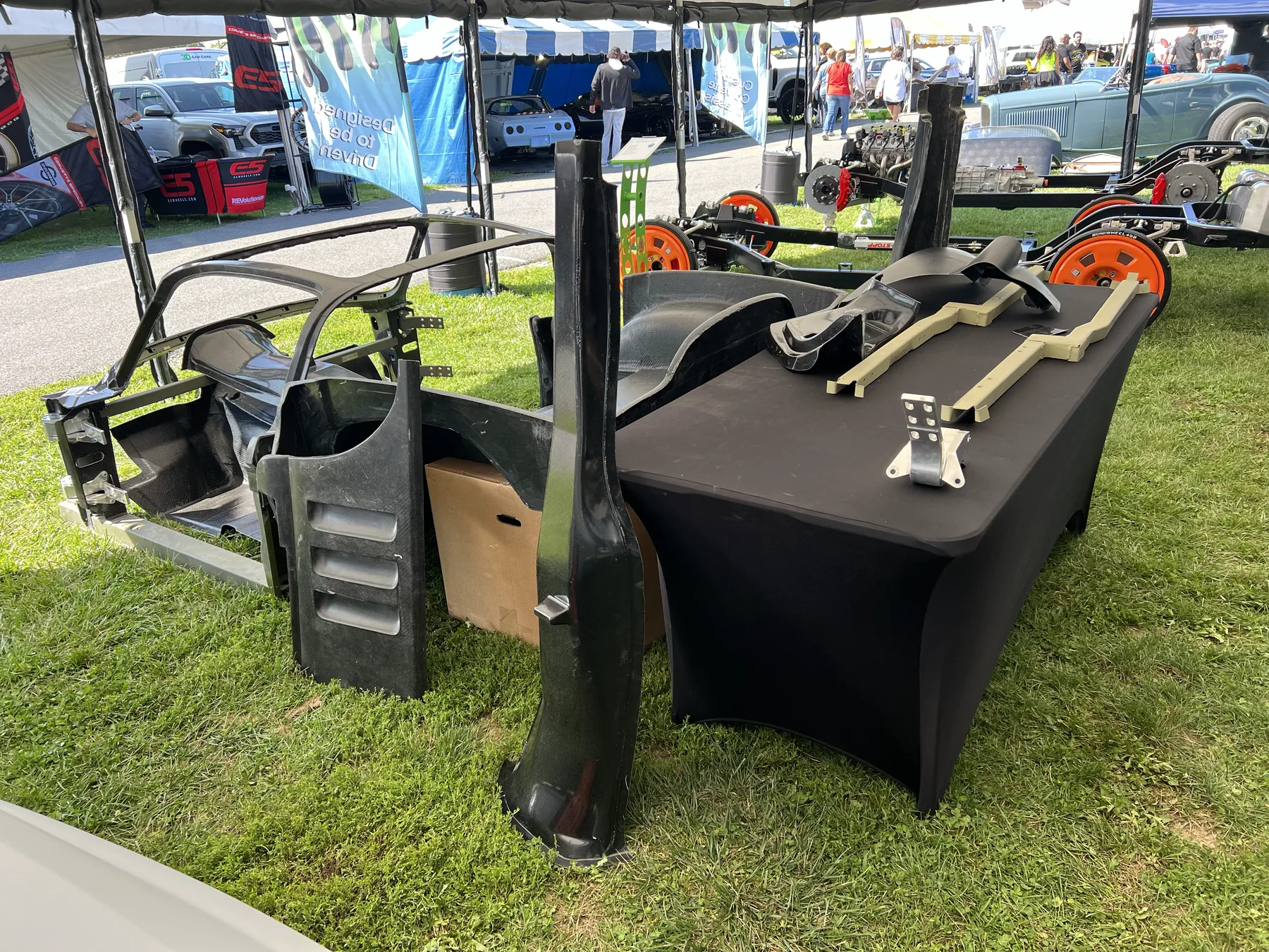 Corvette component table with body pieces.